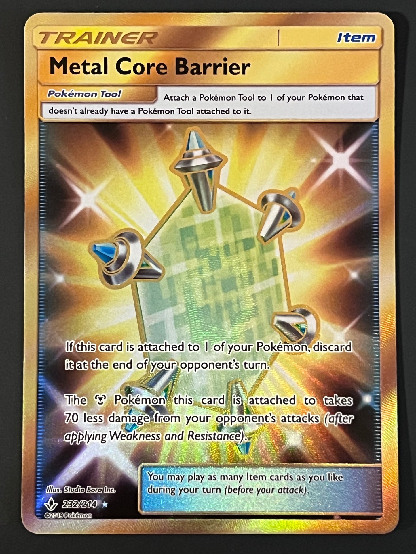 232/214 Metal Core Barrier - Pokémon Unbroken Bonds Gold Secret Rare