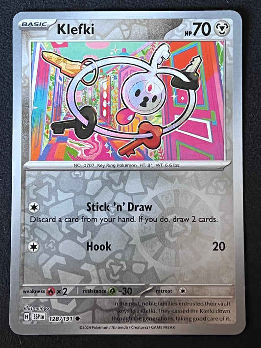 128/191 Klefki - Pokémon Surging Sparks Common Reverse