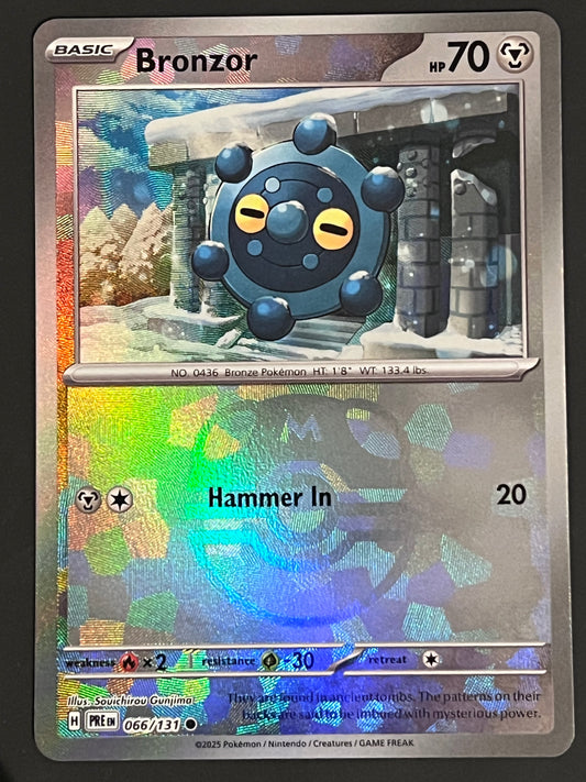 066/131 Bronzor - Pokémon Prismatic Evolutions Common Reverse MASTERBALL