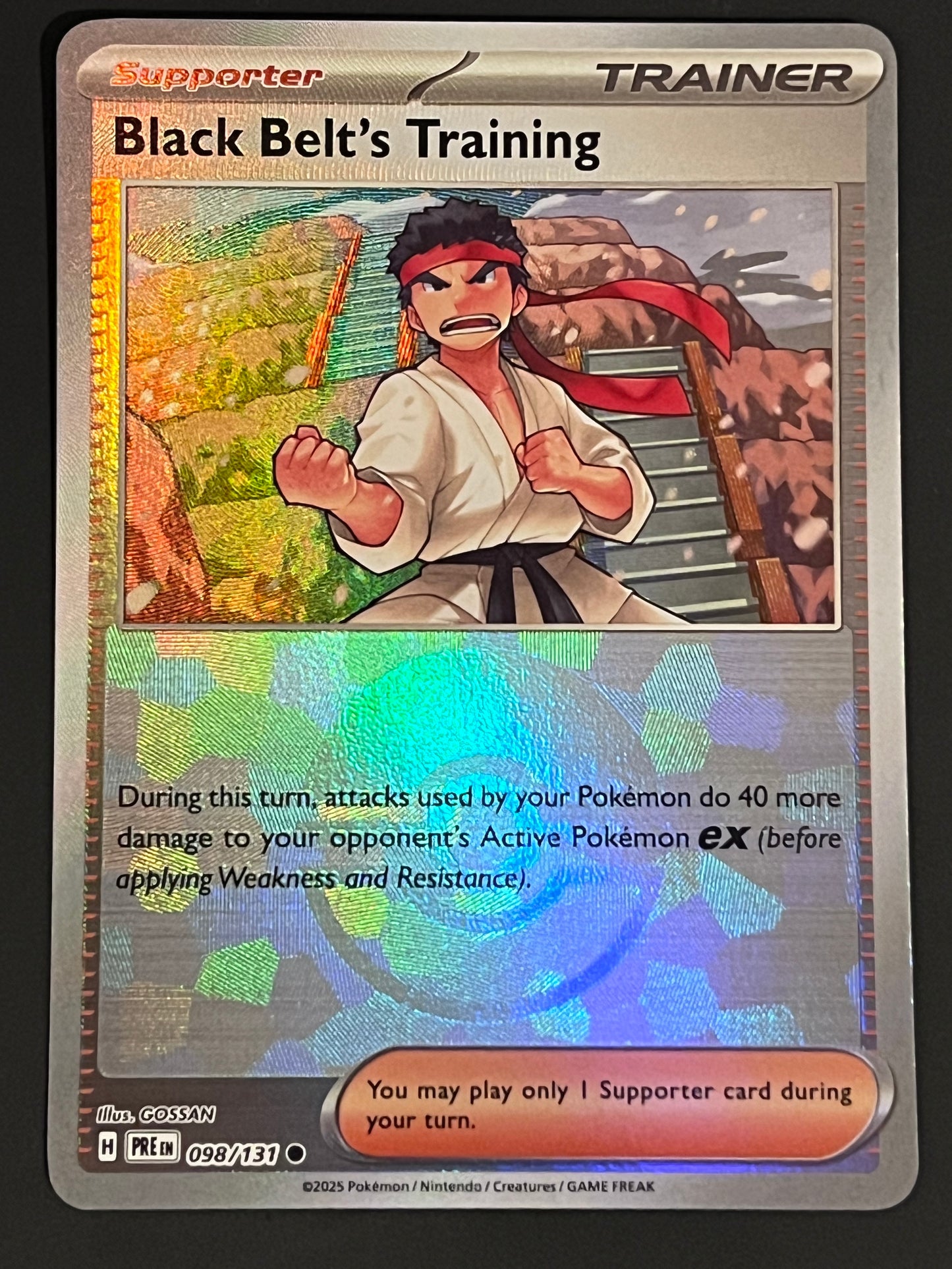 098/131 Black Belt’s Training - Pokémon Prismatic Evolutions Common Reverse POKEBALL