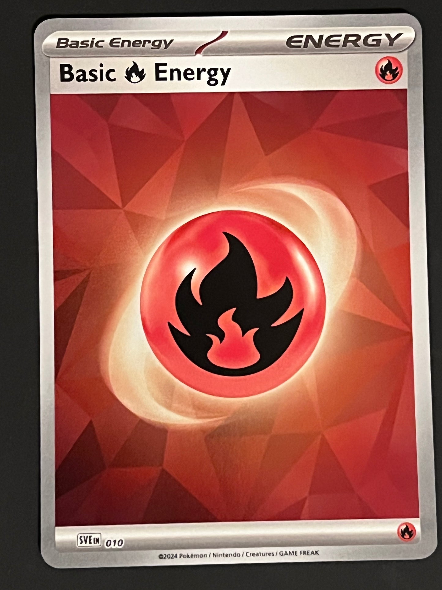 Energy 010 Fire - Pokémon Prismatic Evolutions Reverse