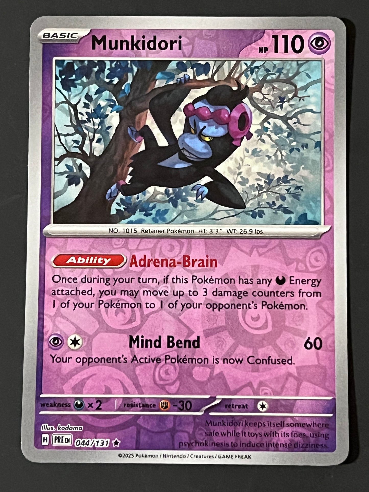 044/131 Munkidori - Pokémon Prismatic Evolutions Rare Reverse